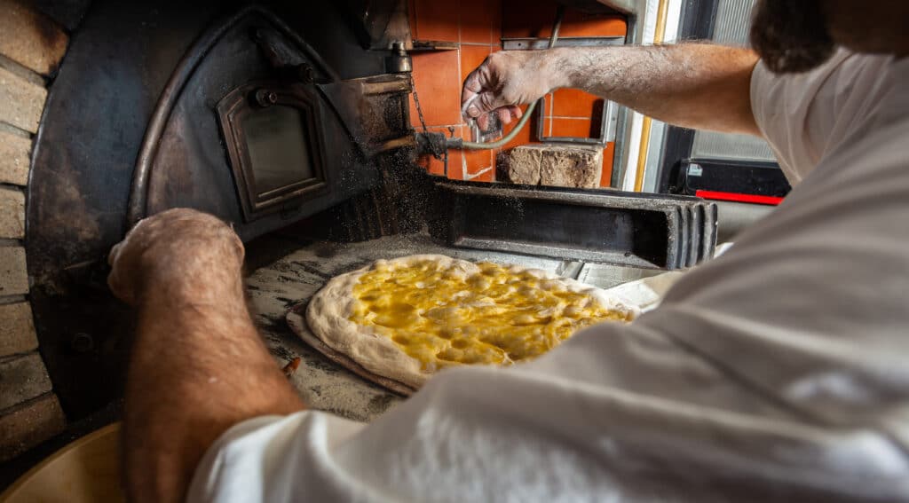 Schiacciata All'Olio Is One Of Tuscany'S Top Bakery Treats. It'S A Type Of Flat Bread Made With Flour, Water, Yeast, Salt And Olive Oil.