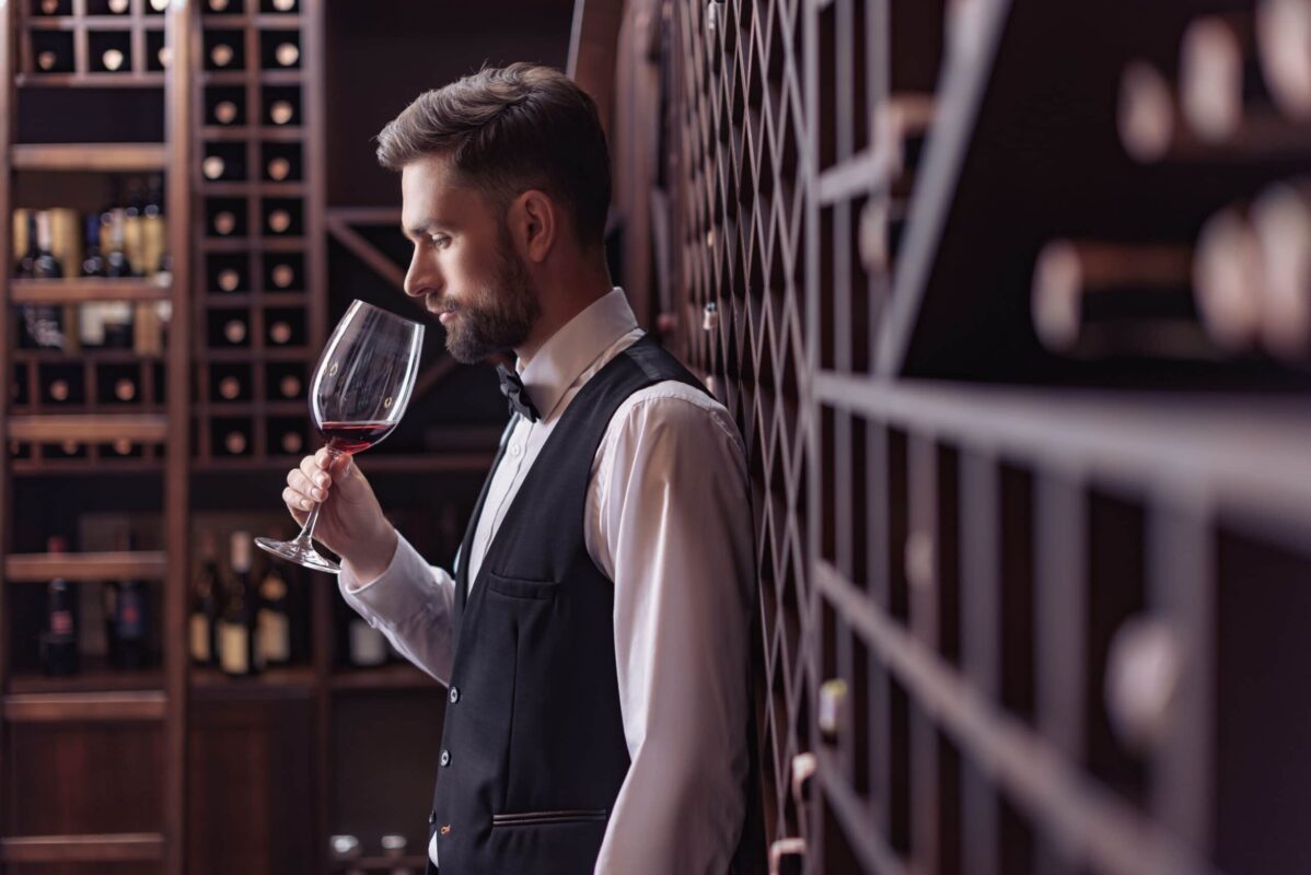 Young Handsome Man Sommelier Tasting Red Wine In W Prn4Aak Scaled E1651257796445