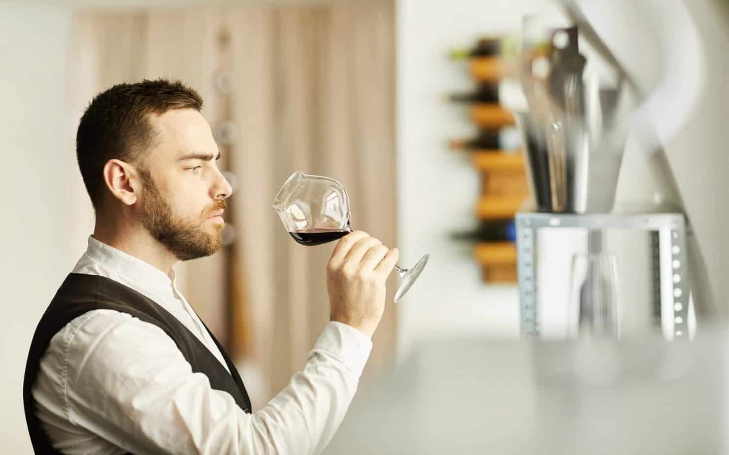 Sommelier Holding Wine Glass