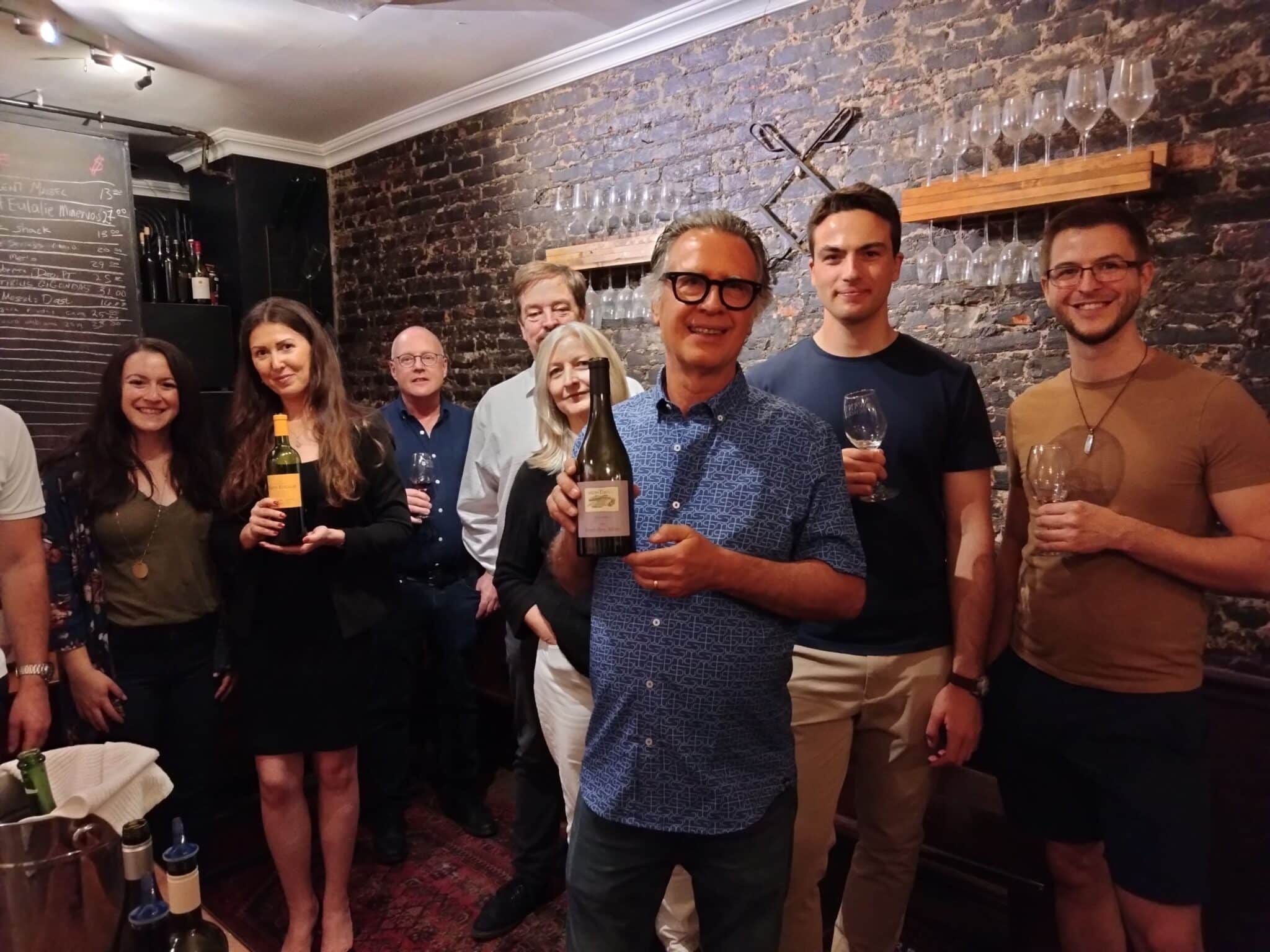 Group enjoying a wine tasting event together.