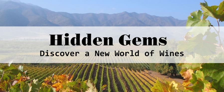 Vineyards under clear sky with 'Hidden Gems' text.